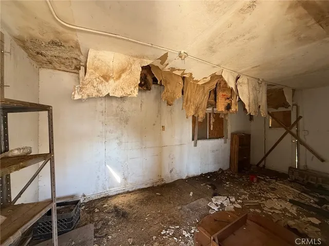 a view of a house with a street