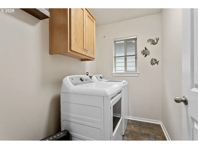 a backyard of a house with yard and outdoor seating