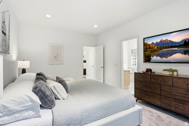 1462 Rio Grande Road Park City, UT 84098 - Photo 15 of 30 Recessed lighting, light gray carpeting, and a light-toned fabric bed frame
