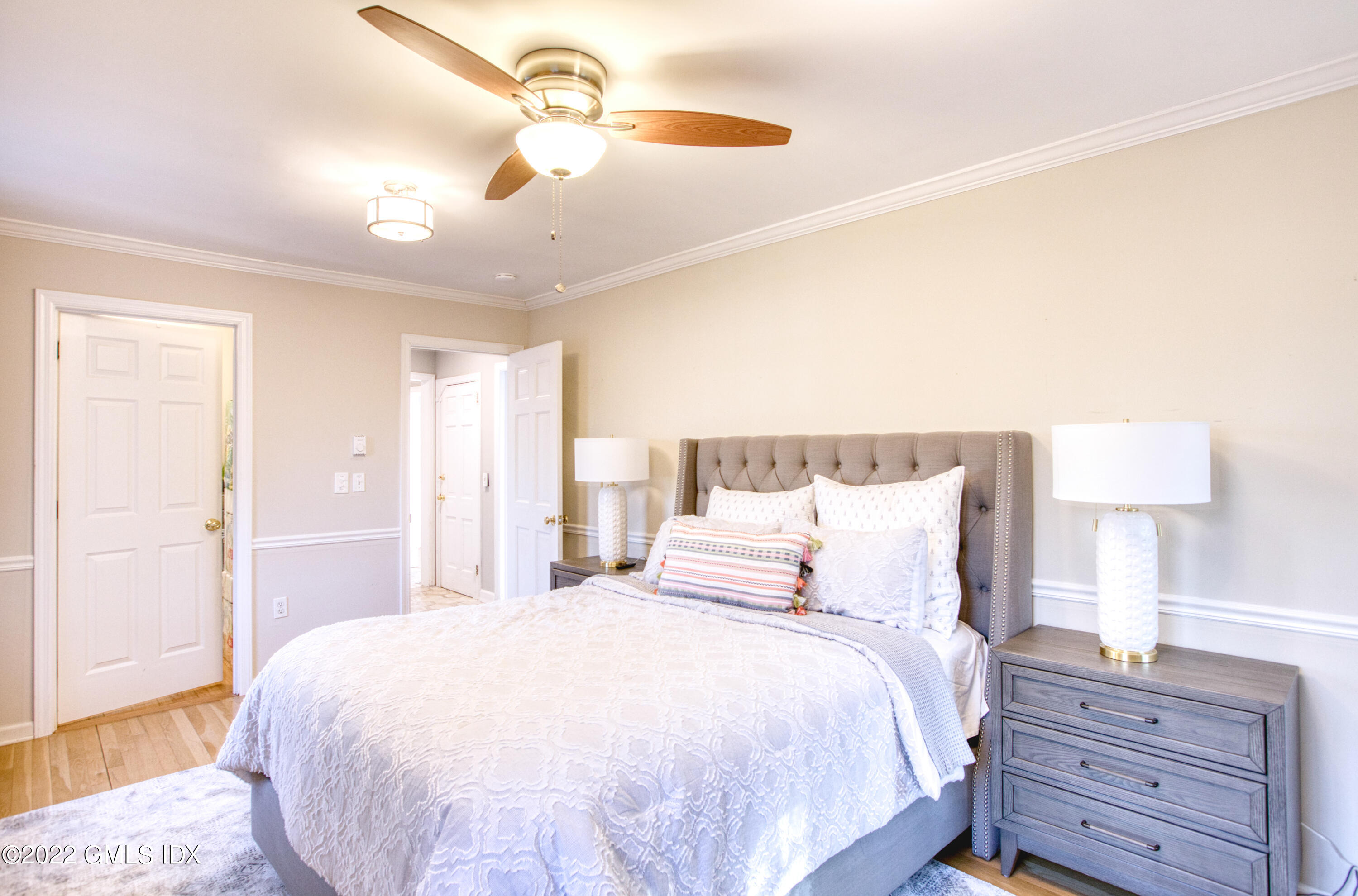 22 Indian Mill Road Cos Cob, CT 06807 - Photo 14 of 24 a bedroom with a bed and a night stand