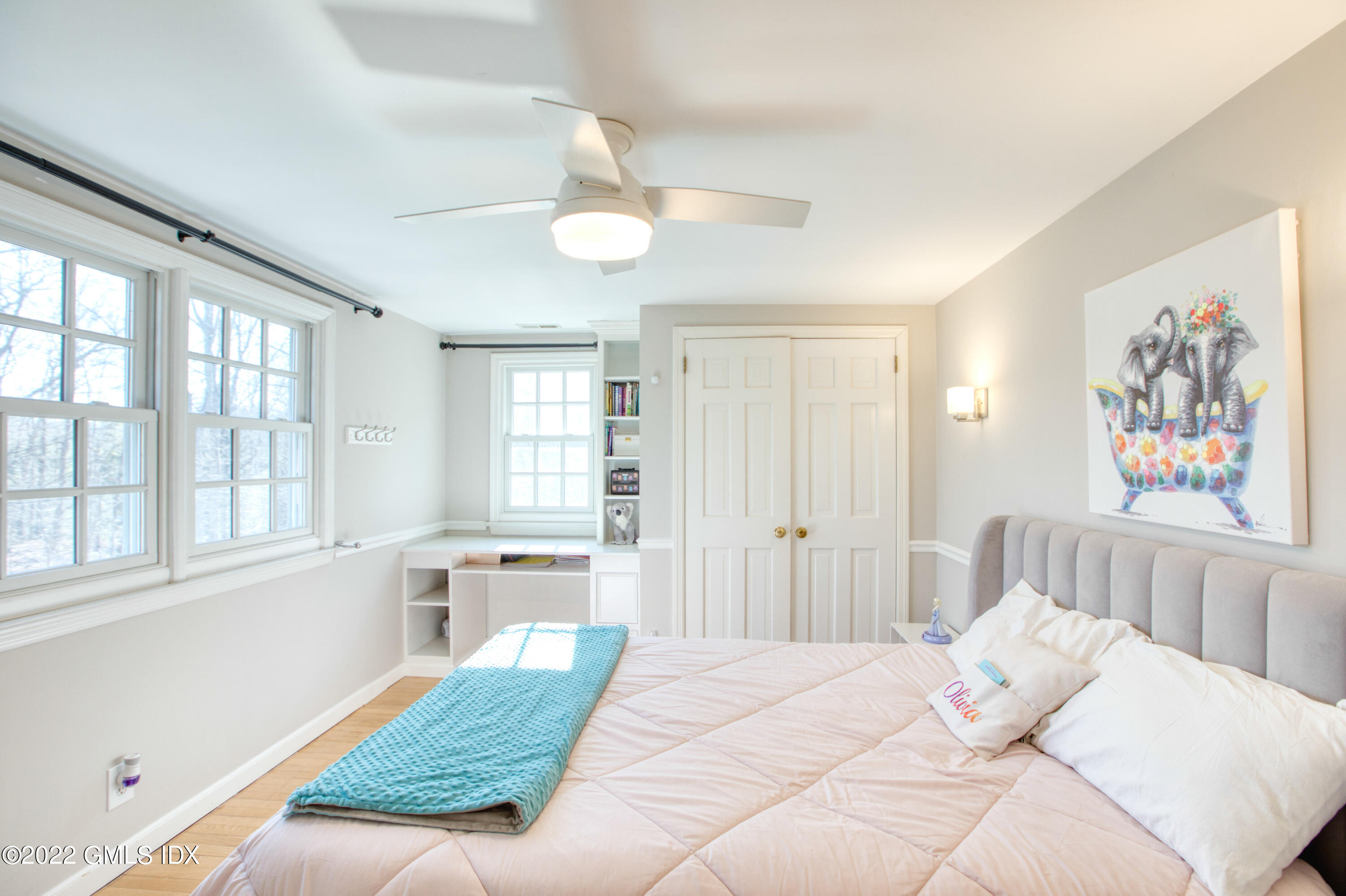 22 Indian Mill Road Cos Cob, CT 06807 - Photo 15 of 24 a bedroom with a bed and a window