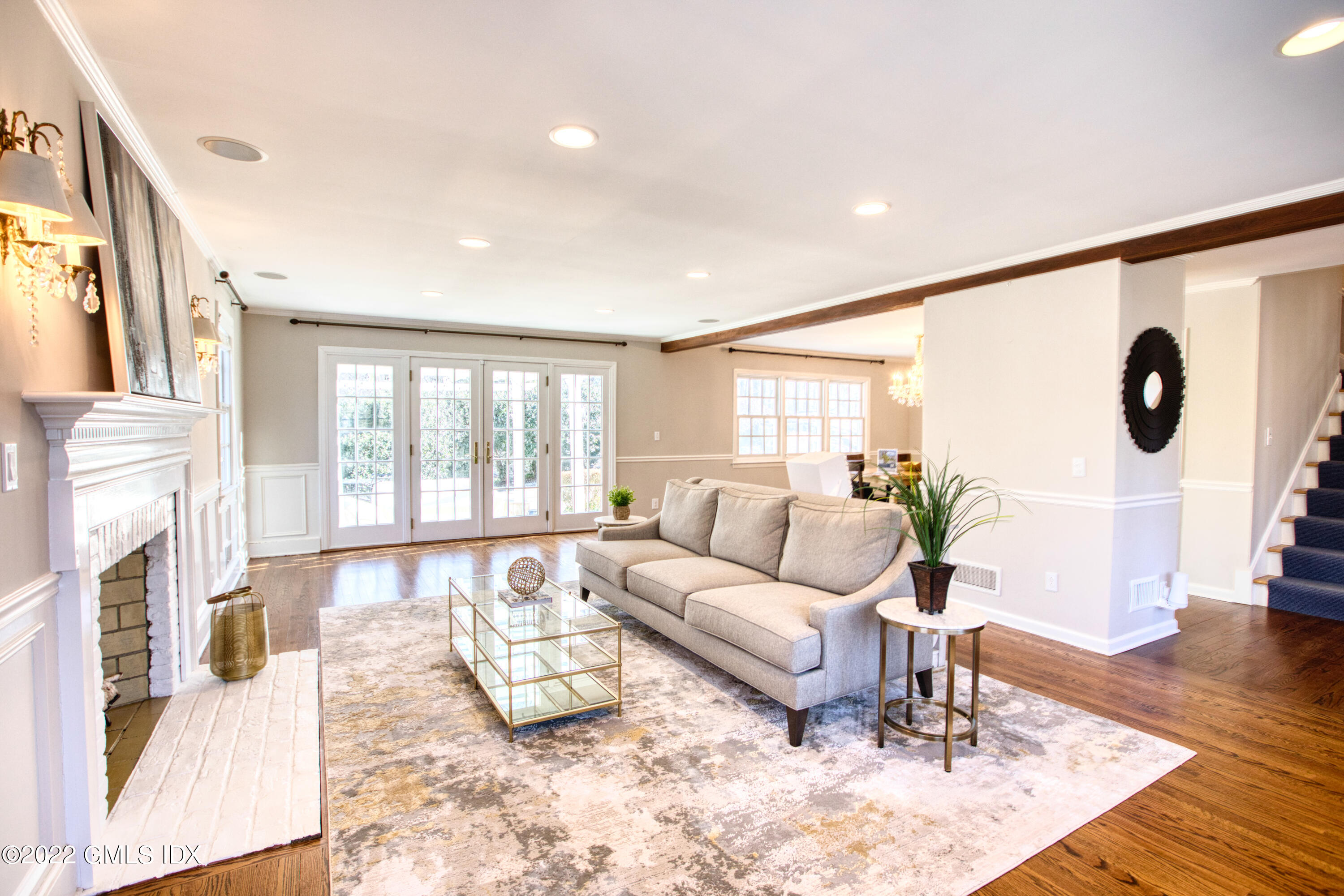22 Indian Mill Road Cos Cob, CT 06807 - Photo 5 of 24 a living room with furniture and a large window