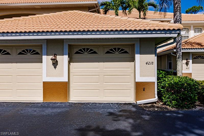 8135 Celeste Drive, Unit 4218 Naples, FL 34113 - Photo 2 of 37 a front view of a house