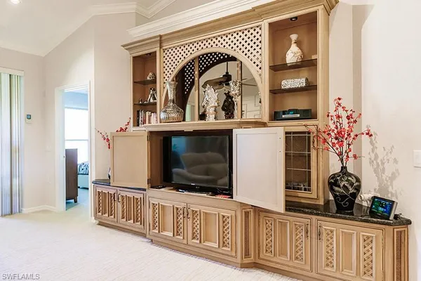a view of living room with furniture and flat screen tv
