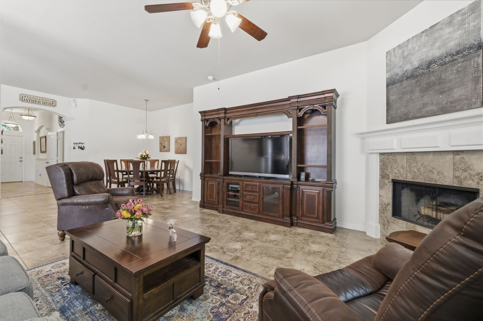 10802 Windswept Montgomery, TX 77356 - Photo 32 of 42 a living room with furniture and a flat screen tv