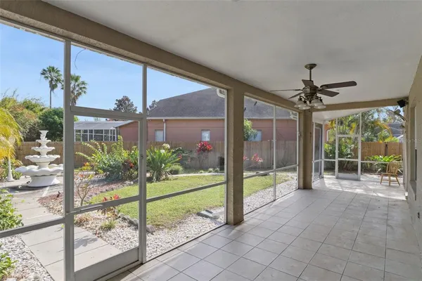 a view of a room with gym equipment and windows