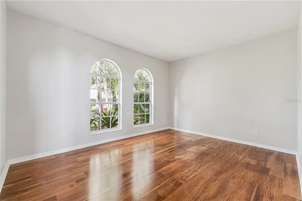 an aerial view of houses with yard