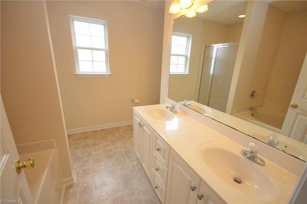 791 Pecan Ridge Circle Kernersville, NC 27284 - Photo 18 of 28 Master bath with dual sinks, garden tub, separate shower