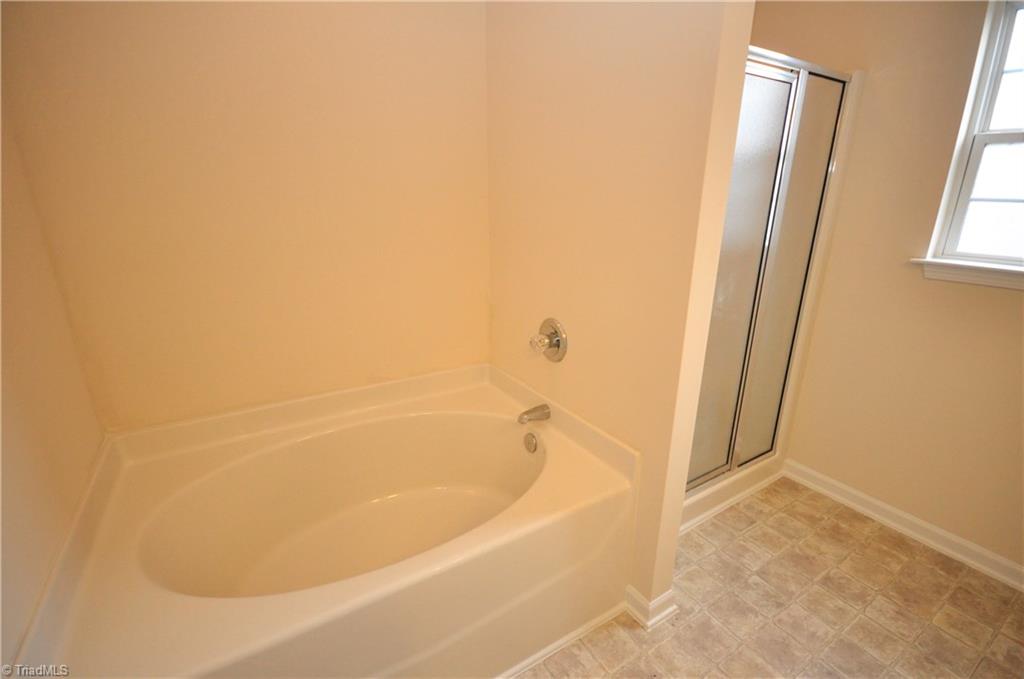 791 Pecan Ridge Circle Kernersville, NC 27284 - Photo 19 of 28 Master bath with garden tub, separate shower