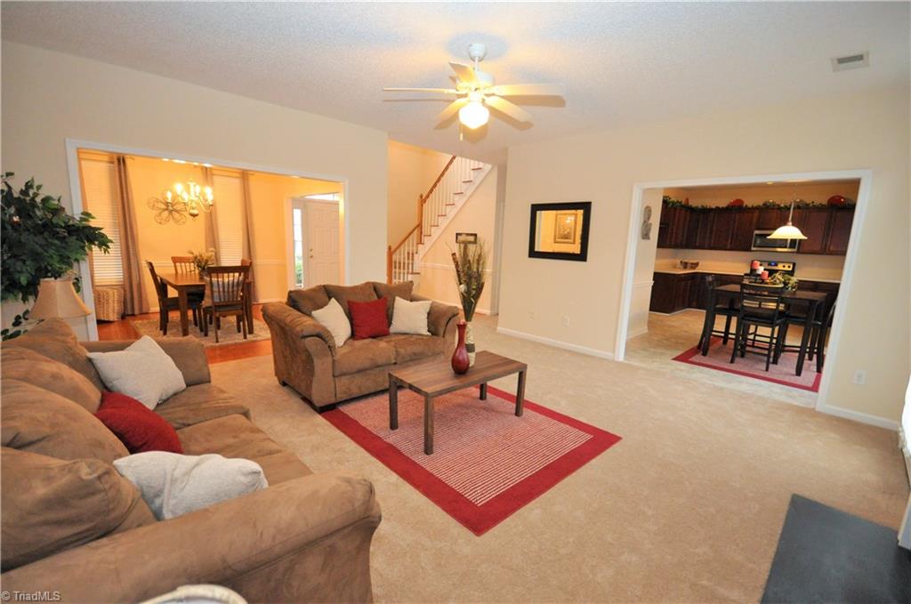 791 Pecan Ridge Circle Kernersville, NC 27284 - Photo 6 of 28 Living Room open to Kitchen and Dining Room