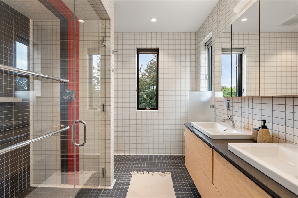 20 Madison Street Cambridge, MA 02138 - Photo 22 of 37 a bathroom with a sink a toilet and shower