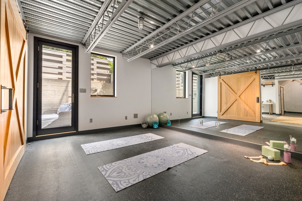 20 Madison Street Cambridge, MA 02138 - Photo 26 of 37 a view of a livingroom with wooden floor and a large window