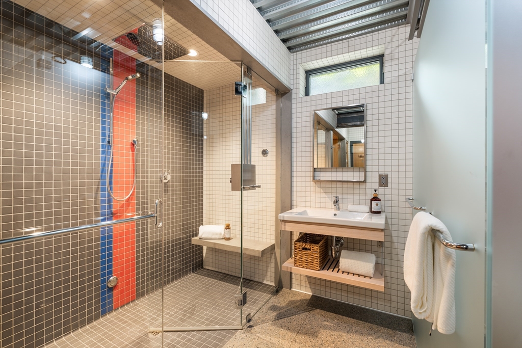 20 Madison Street Cambridge, MA 02138 - Photo 29 of 37 a bathroom with a sink and a mirror