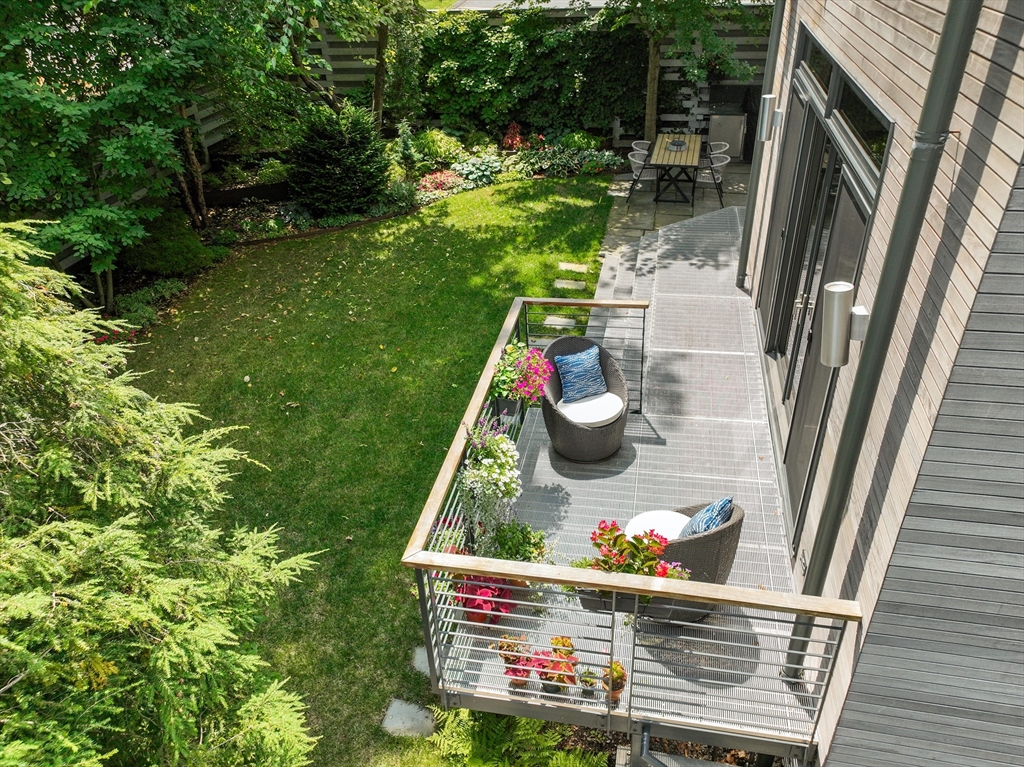20 Madison Street Cambridge, MA 02138 - Photo 30 of 37 a backyard of a house with seating space