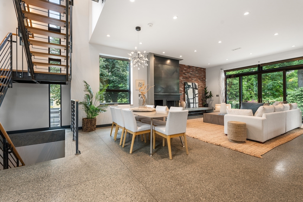 20 Madison Street Cambridge, MA 02138 - Photo 6 of 37 a living room with fireplace furniture and a large window