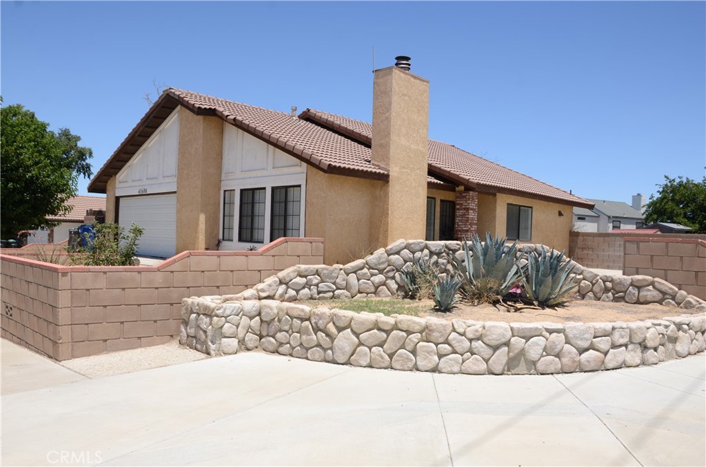 43600 Santa Rosa Circle Lancaster, CA 93535 - Photo 3 of 25 a view of a house with a yard