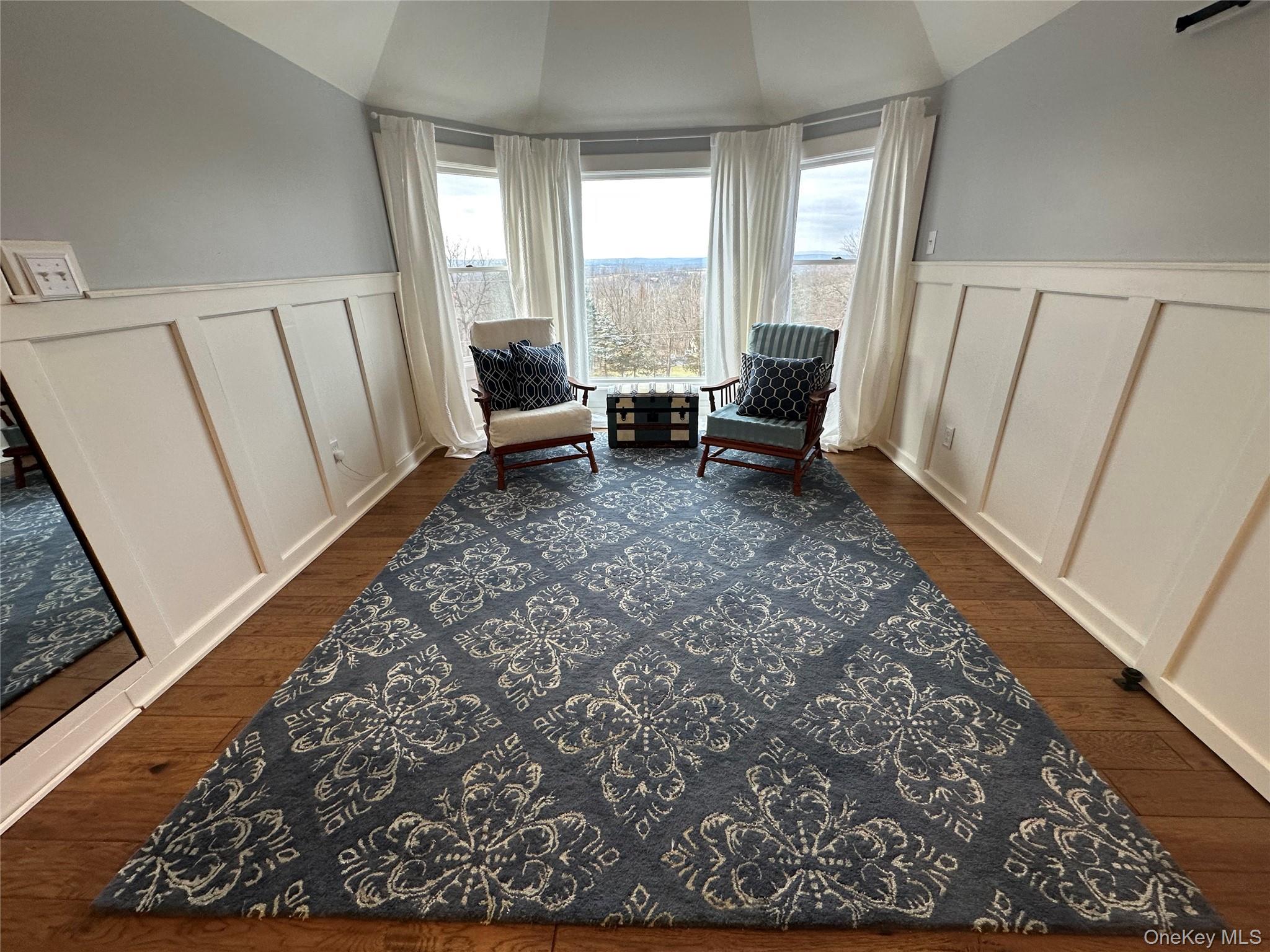 256 Ridge Road Campbell Hall, NY 10916 - Photo 25 of 36 Living area with dark hardwood / wood-style flooring and vaulted ceiling