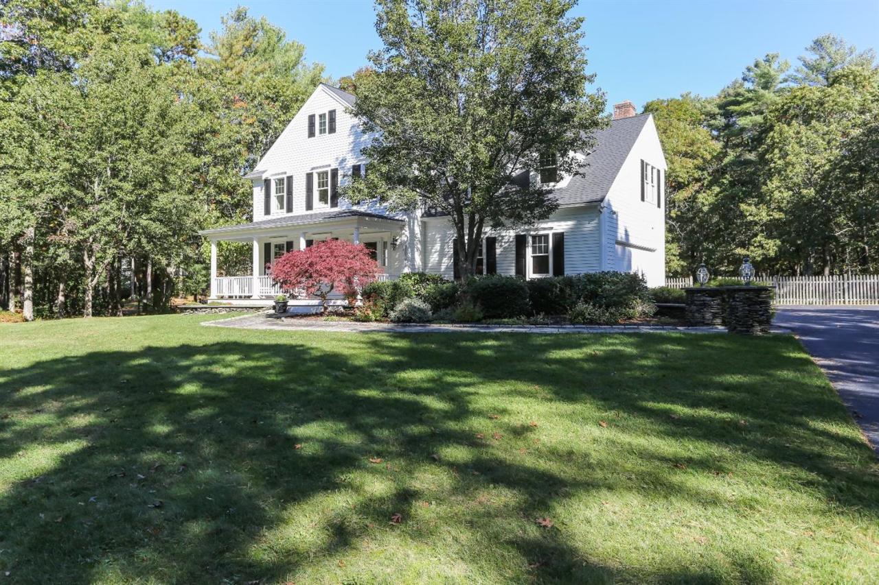 218 Little River Road Cotuit, MA 02635 - Photo 1 of 30 a front view of house with yard and green space