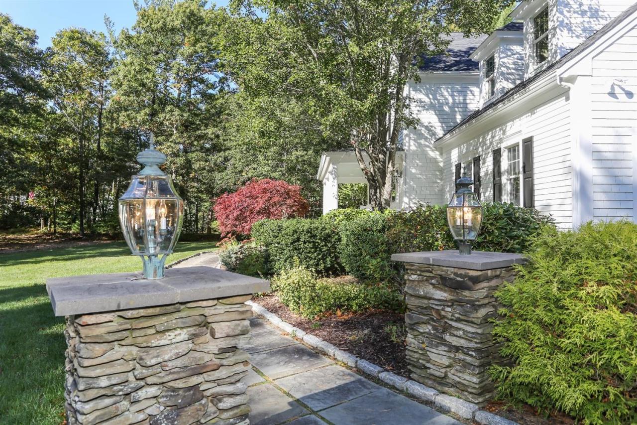 218 Little River Road Cotuit, MA 02635 - Photo 2 of 30 a view of a garden with large trees