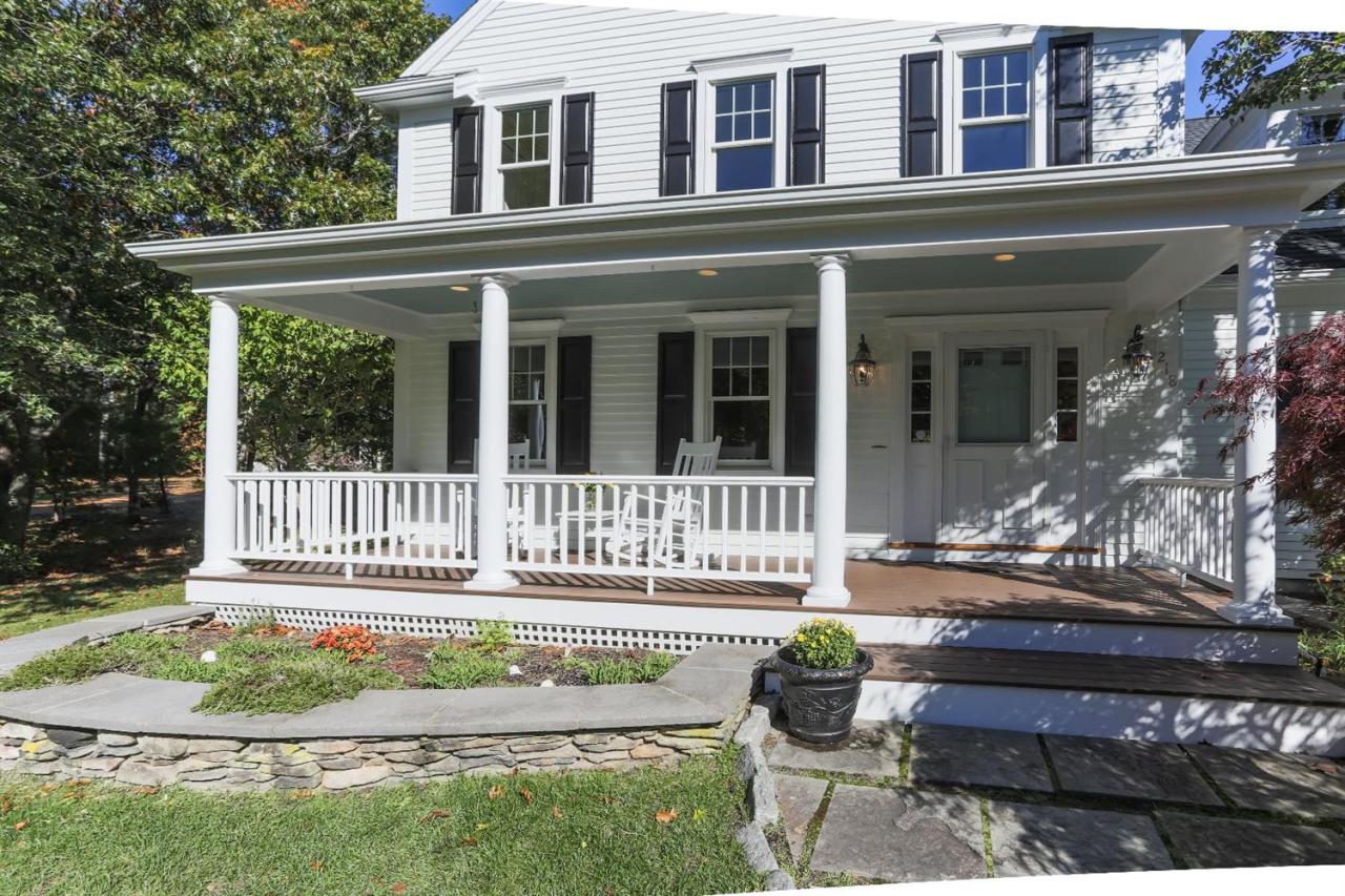 218 Little River Road Cotuit, MA 02635 - Photo 5 of 30 a front view of a house with a porch