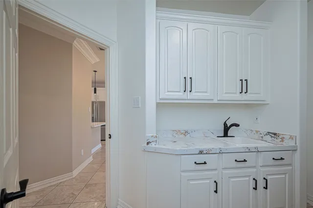 a view of cabinets and window