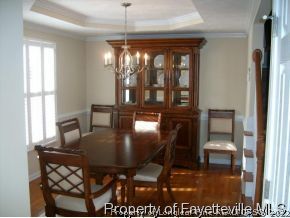 1412 Rough Rider Lane Parkton, NC 28371 - Photo 5 of 12 a dining room with furniture and window