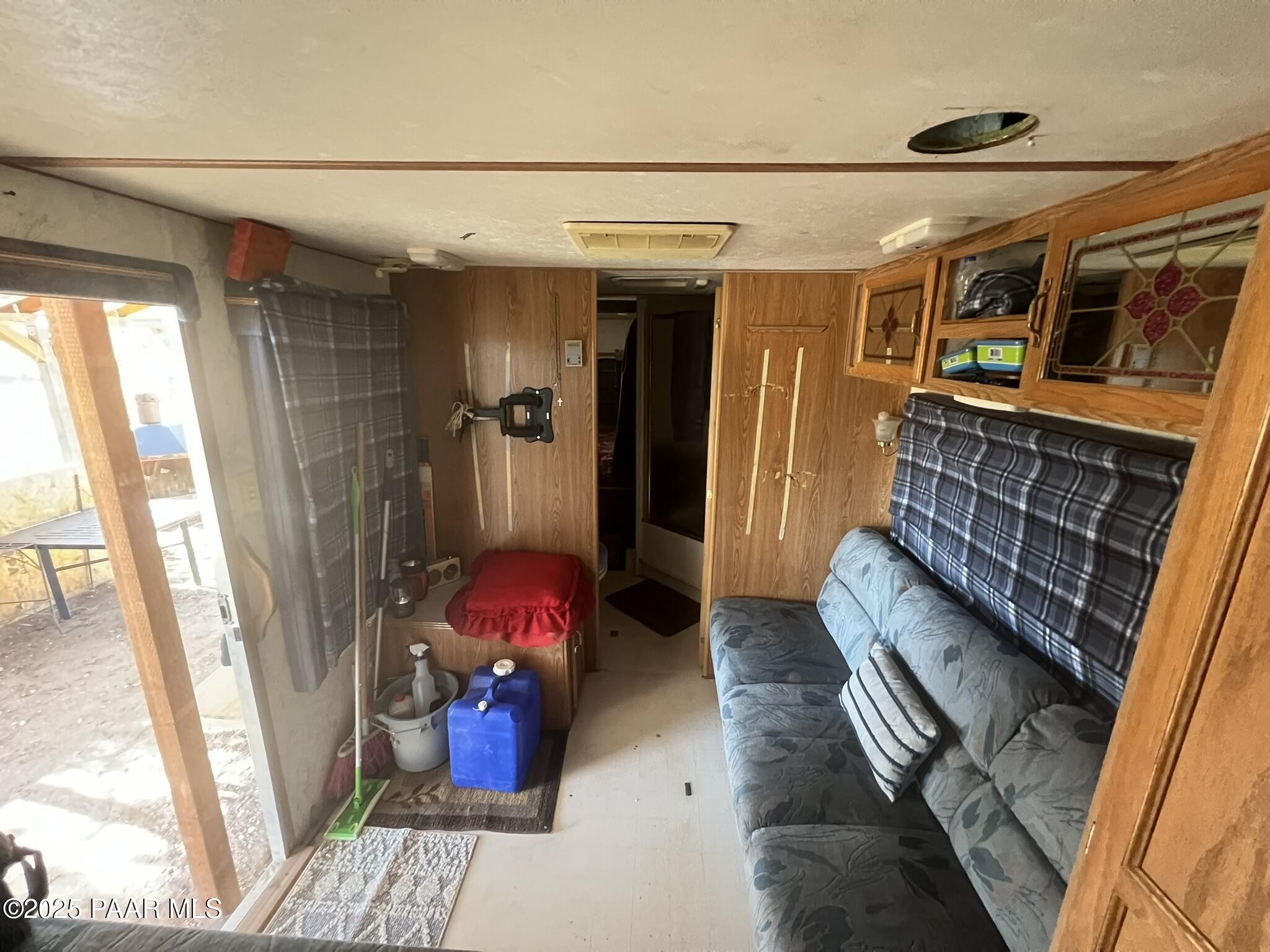 228 Flying Wrench Road Ash Fork, AZ 86320 - Photo 15 of 16 a view of storage and utility room