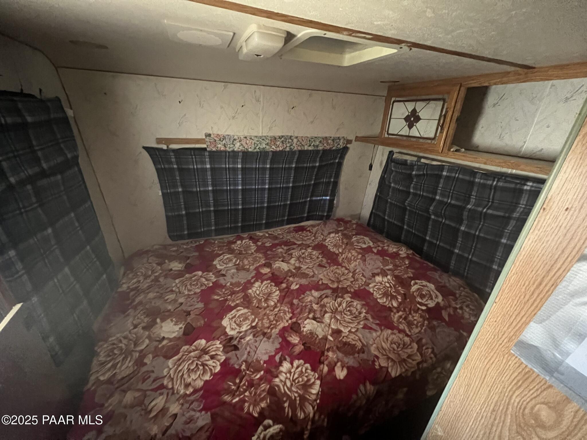 228 Flying Wrench Road Ash Fork, AZ 86320 - Photo 16 of 16 a view of a door of the house