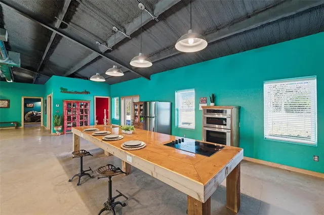 a view of a swimming pool with a patio