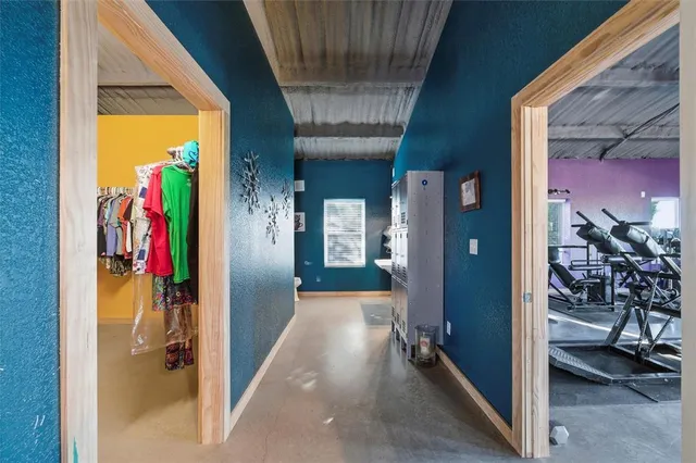 a view of a room with gym equipment