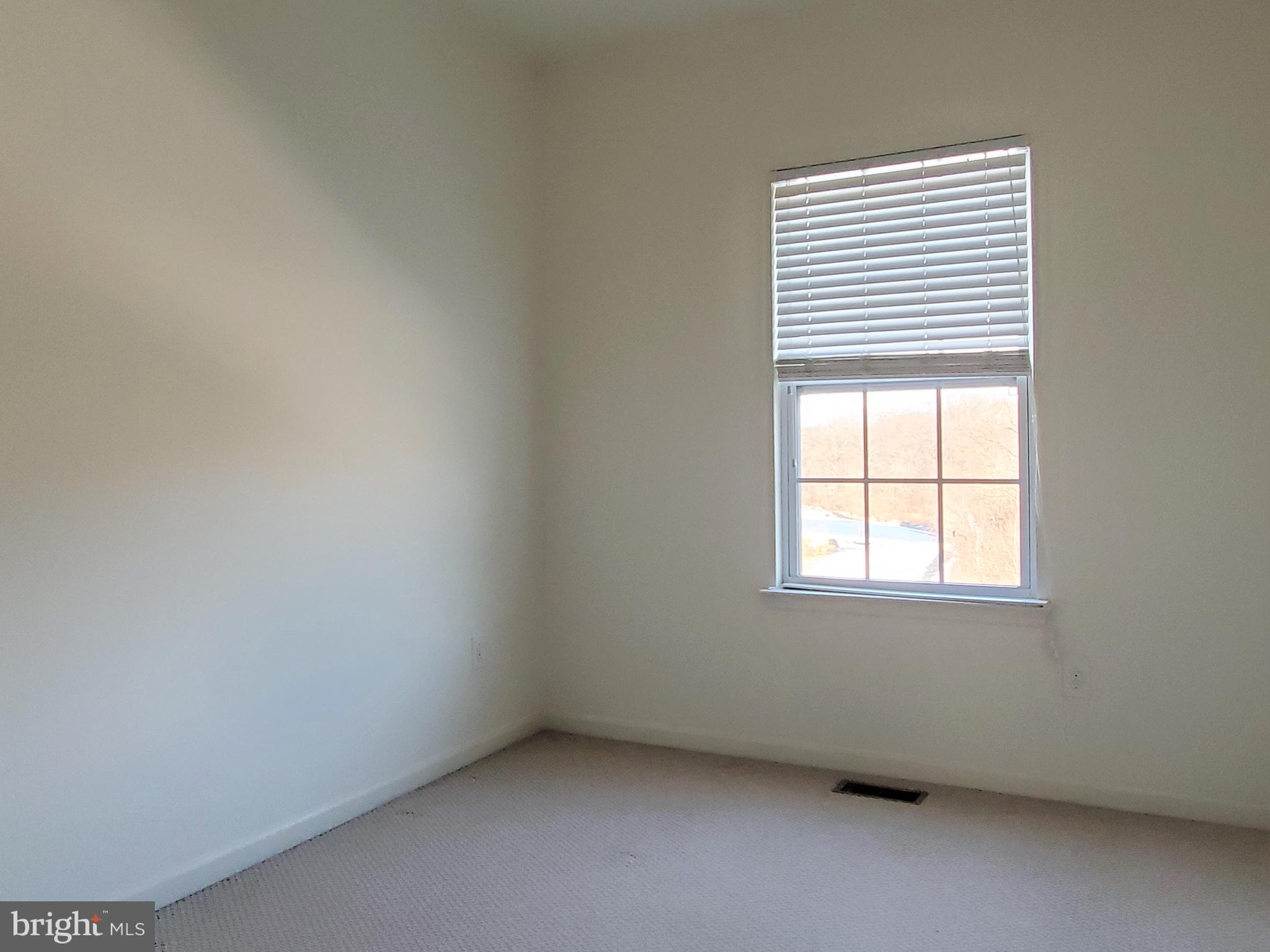 327 Lenape Way Claymont, DE 19703 - Photo 15 of 17 an empty room with a window