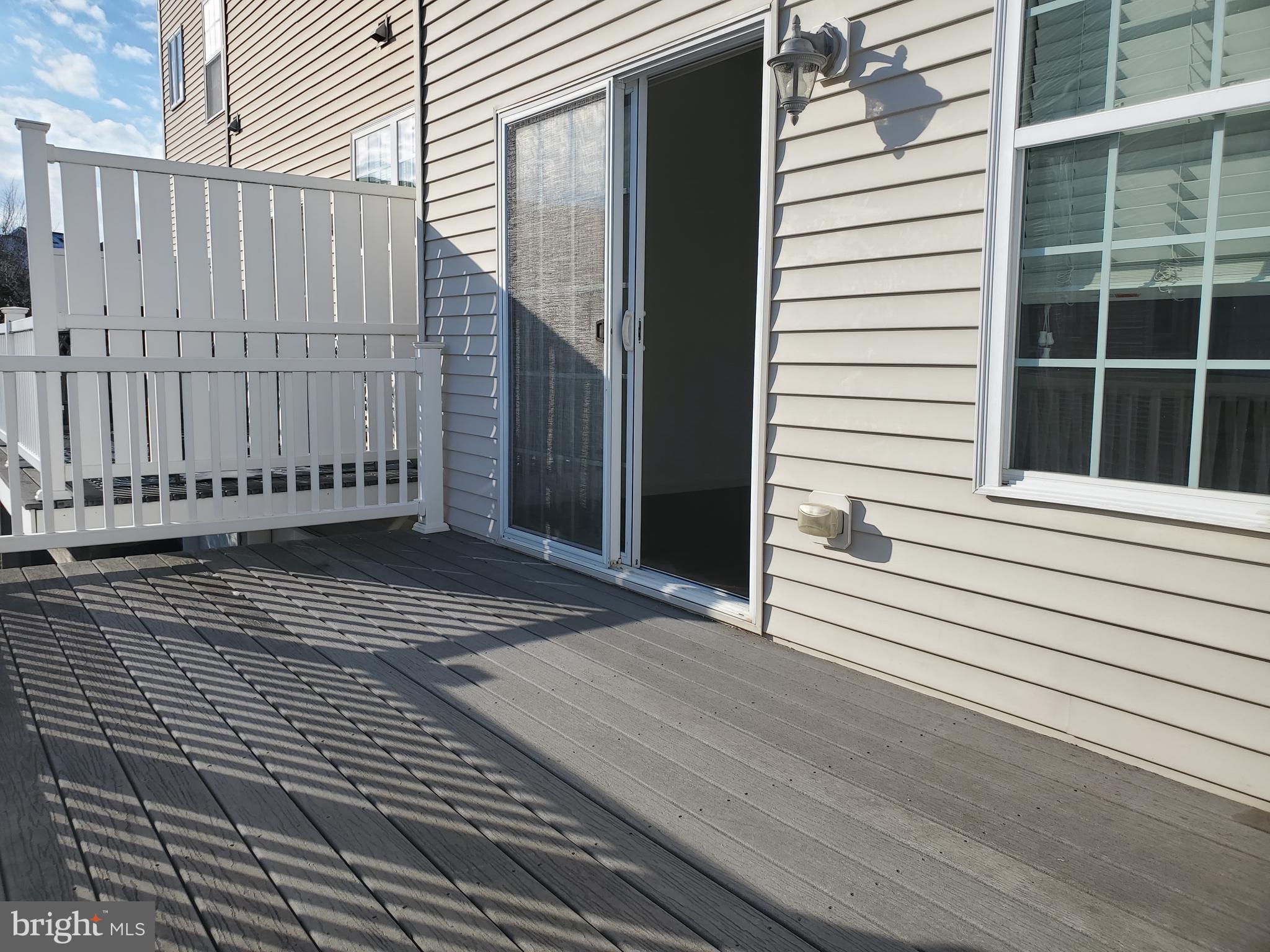 327 Lenape Way Claymont, DE 19703 - Photo 10 of 17 a view of a balcony with door