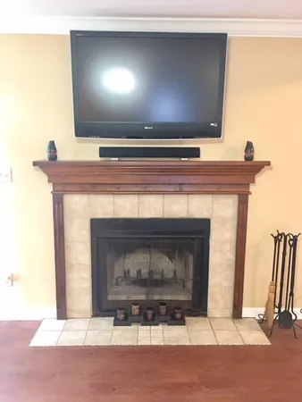 a fireplace with a clock on it