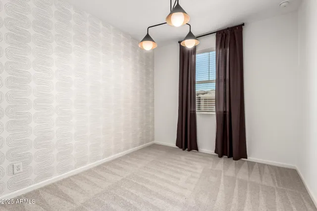 a bathroom with a sink toilet vanity and shower