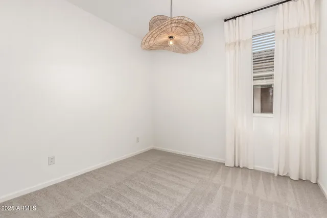 an empty room with a bathroom