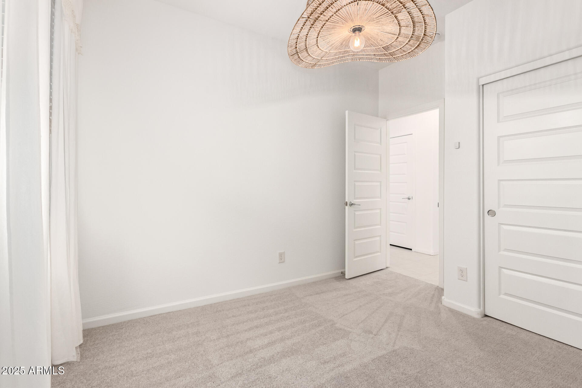 12524 West Trumbull Road Avondale, AZ 85323 - Photo 20 of 34 a view of an empty room