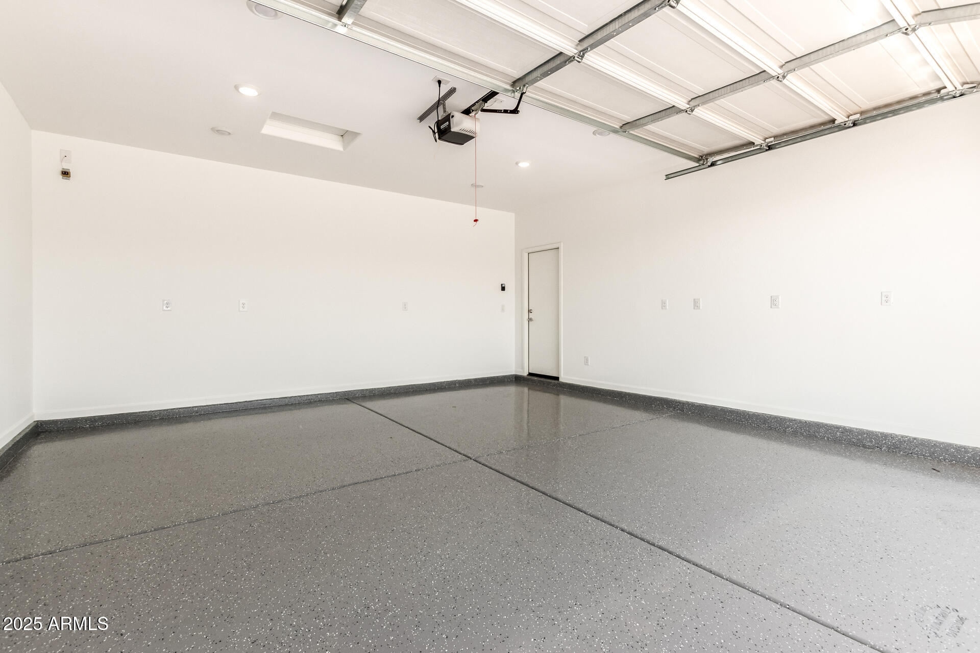 12524 West Trumbull Road Avondale, AZ 85323 - Photo 27 of 34 a view of a refrigerator in a room