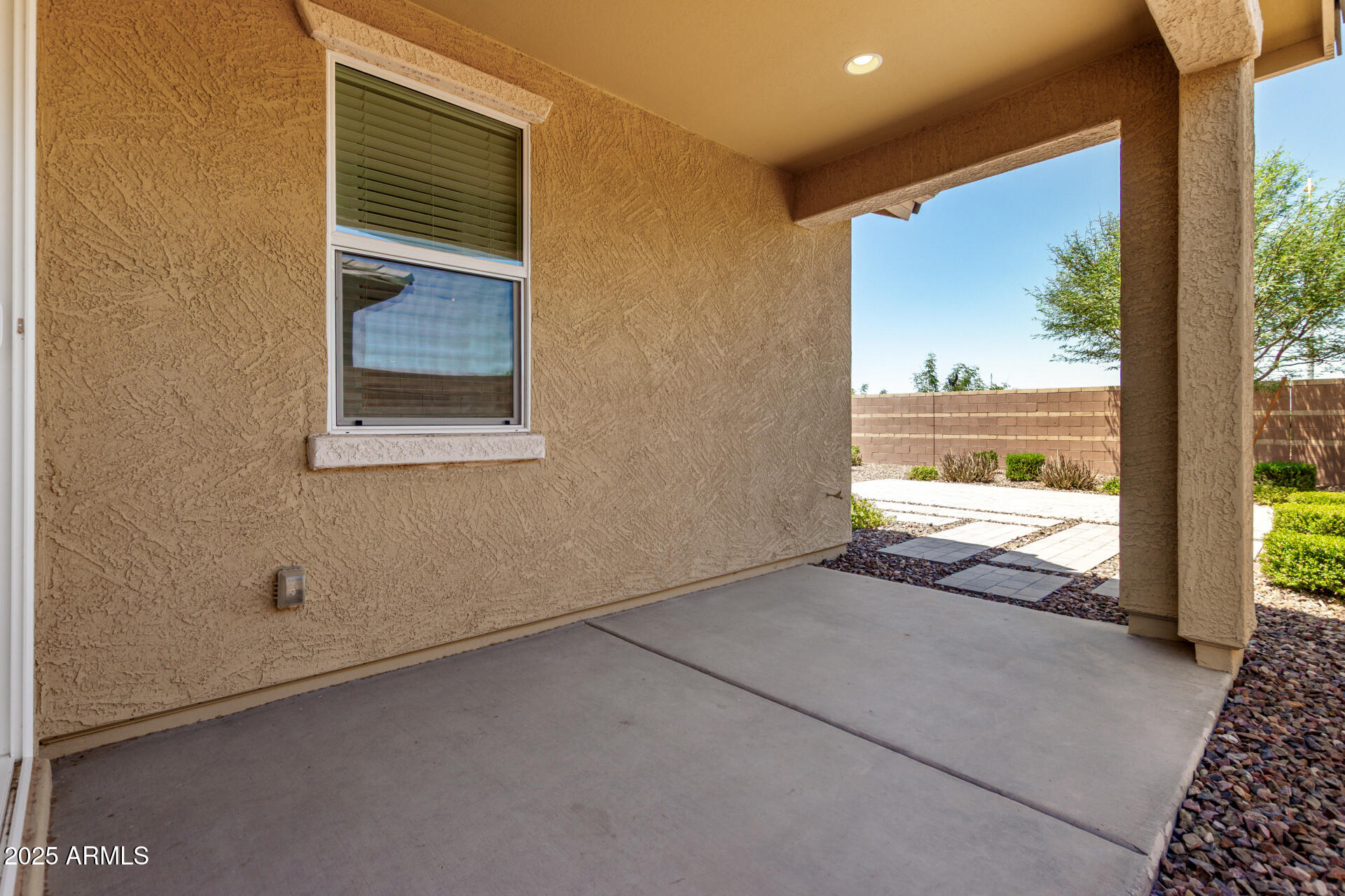 12524 West Trumbull Road Avondale, AZ 85323 - Photo 32 of 34 a view of an empty room and window