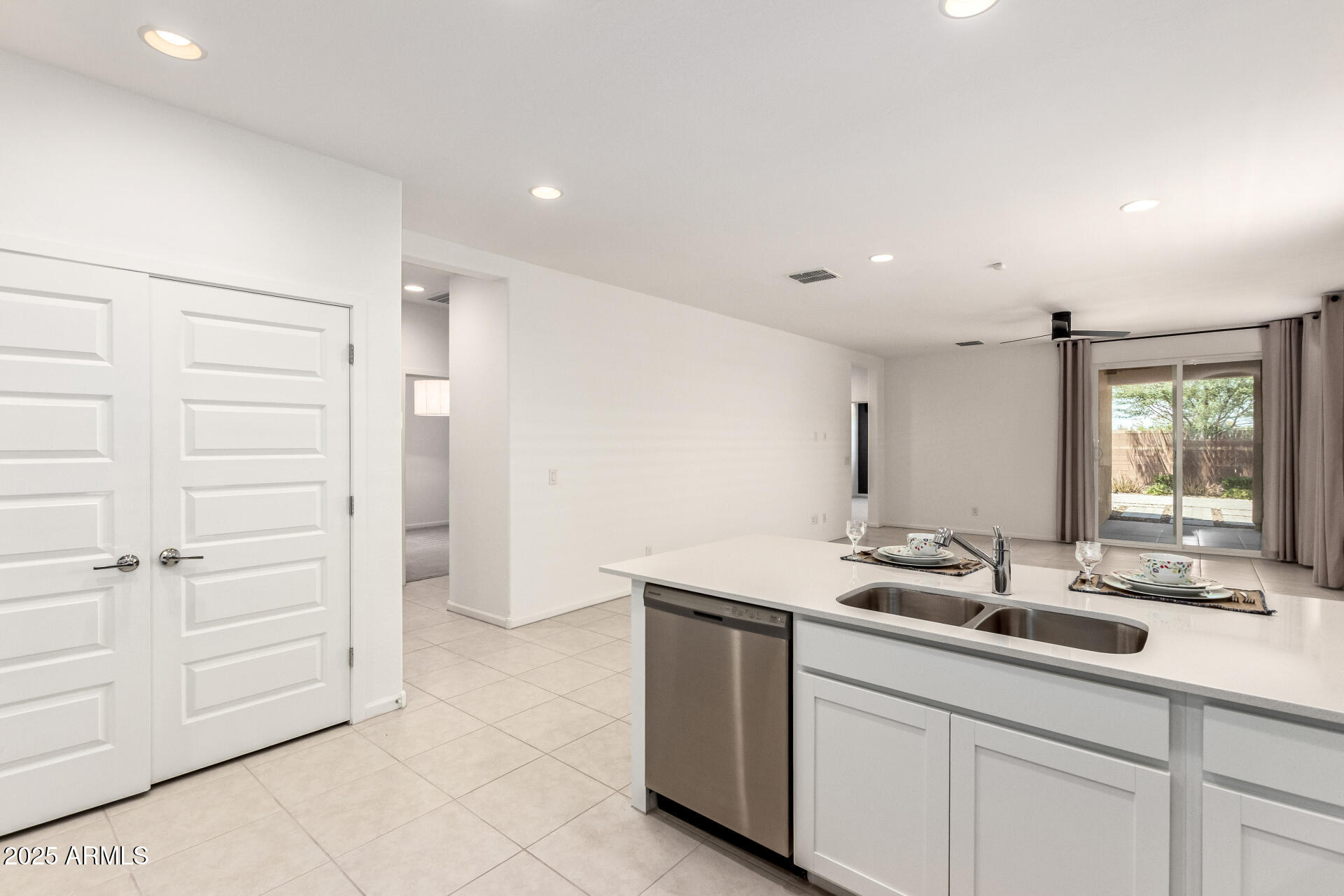 12524 West Trumbull Road Avondale, AZ 85323 - Photo 6 of 34 a bathroom with a sink and a mirror