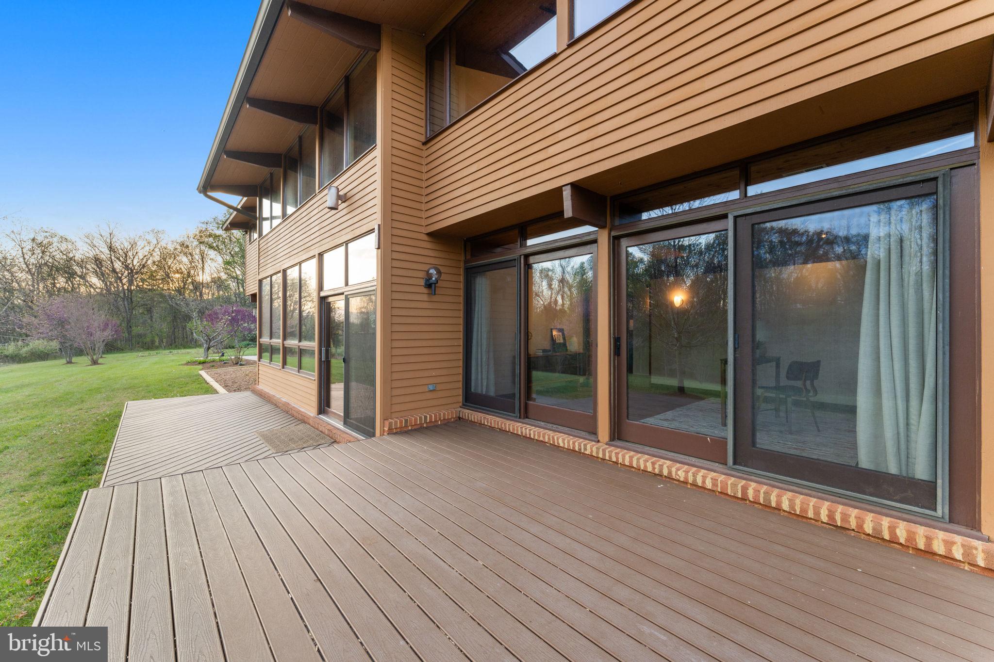 219 Tiger Valley Road Washington, VA 22747 - Photo 59 of 77 24x8 Trex deck off 2 story solar room