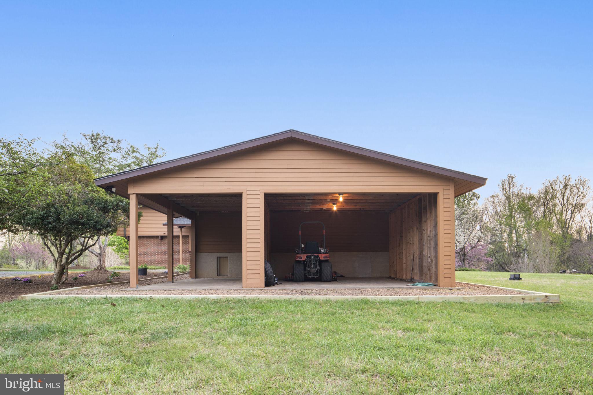 219 Tiger Valley Road Washington, VA 22747 - Photo 61 of 77 Attached covered workshop shed