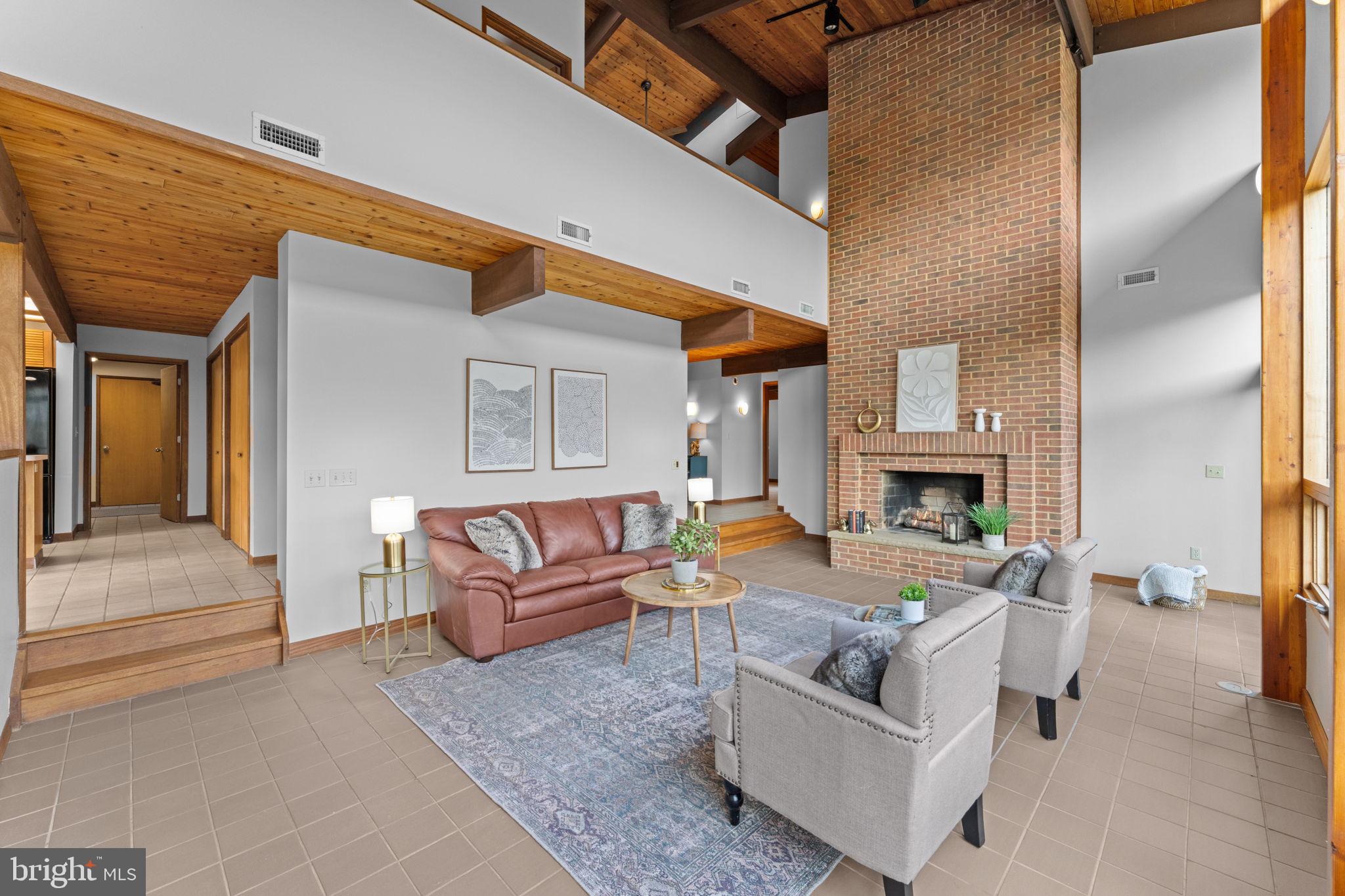 219 Tiger Valley Road Washington, VA 22747 - Photo 7 of 77 Two story fireplace for cozy days