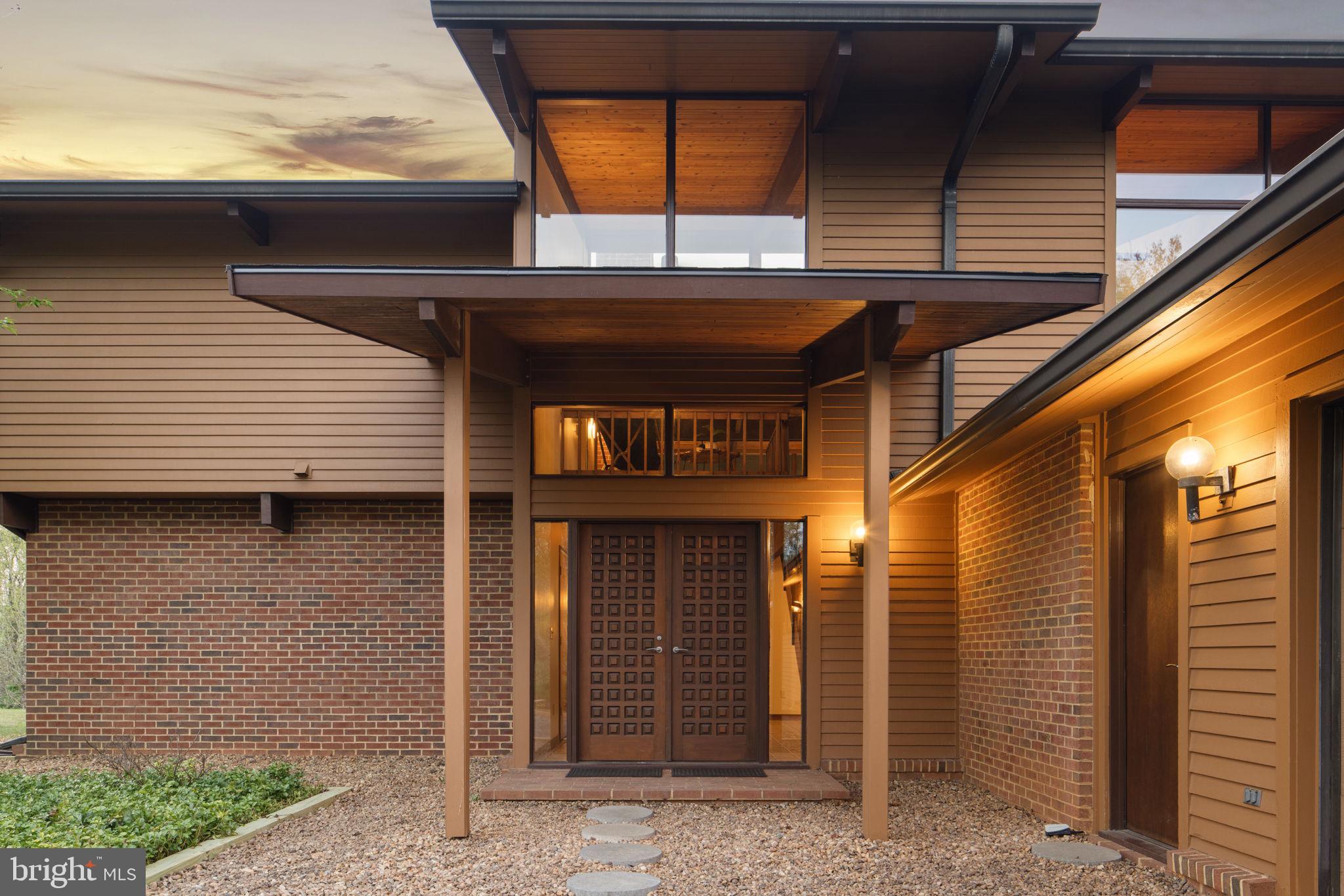 219 Tiger Valley Road Washington, VA 22747 - Photo 74 of 77 Stone pebble front entrance walkway