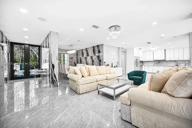 a bathroom with a sink and mirror