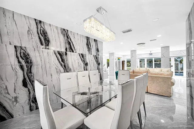 a bathroom with a sink a mirror and a toilet