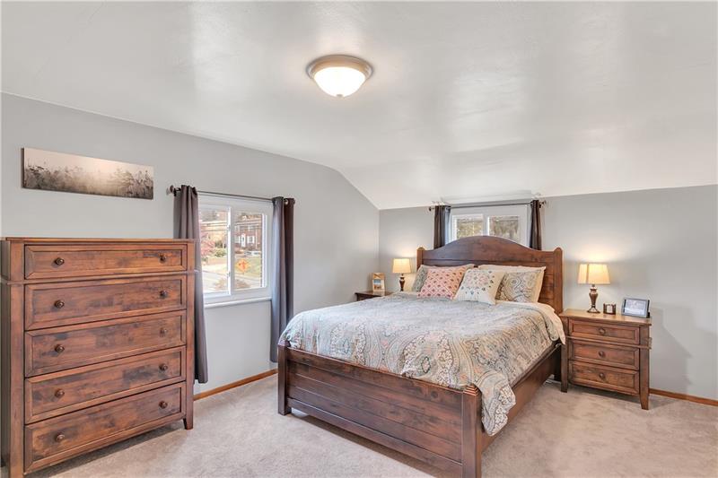 6333 Verona Road Verona, PA 15147 - Photo 12 of 25 Spacious Upper Level Master Bedroom with Fresh Paint and Neutral Carpet, Measuring 15x12.