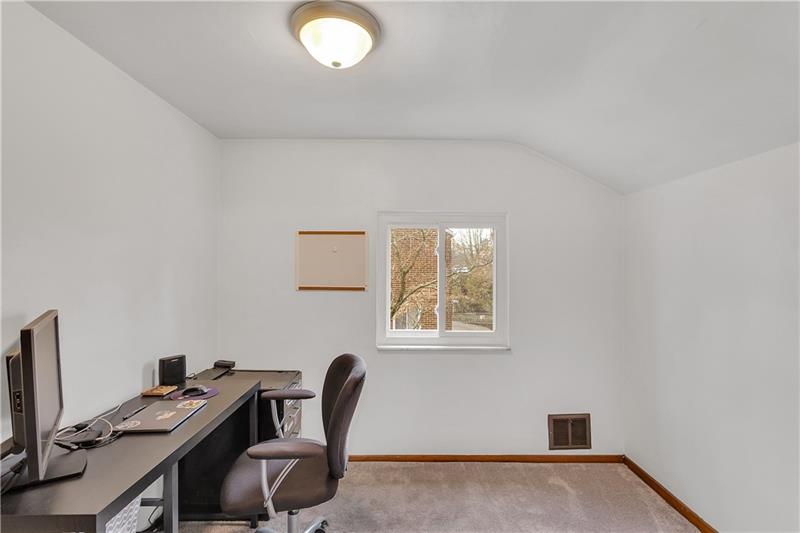 6333 Verona Road Verona, PA 15147 - Photo 16 of 25 The Third Bedroom on the Upper Level is Currently Being Used as an Office. Measures 9x8, Neutral Carpet and Paint.