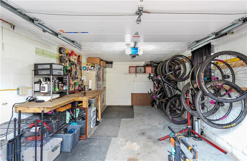 6333 Verona Road Verona, PA 15147 - Photo 18 of 25 The One Car Garage has a Built In, Wooden Work Bench that Stays with the Home, and Newer Garage Door Lift/Opener.