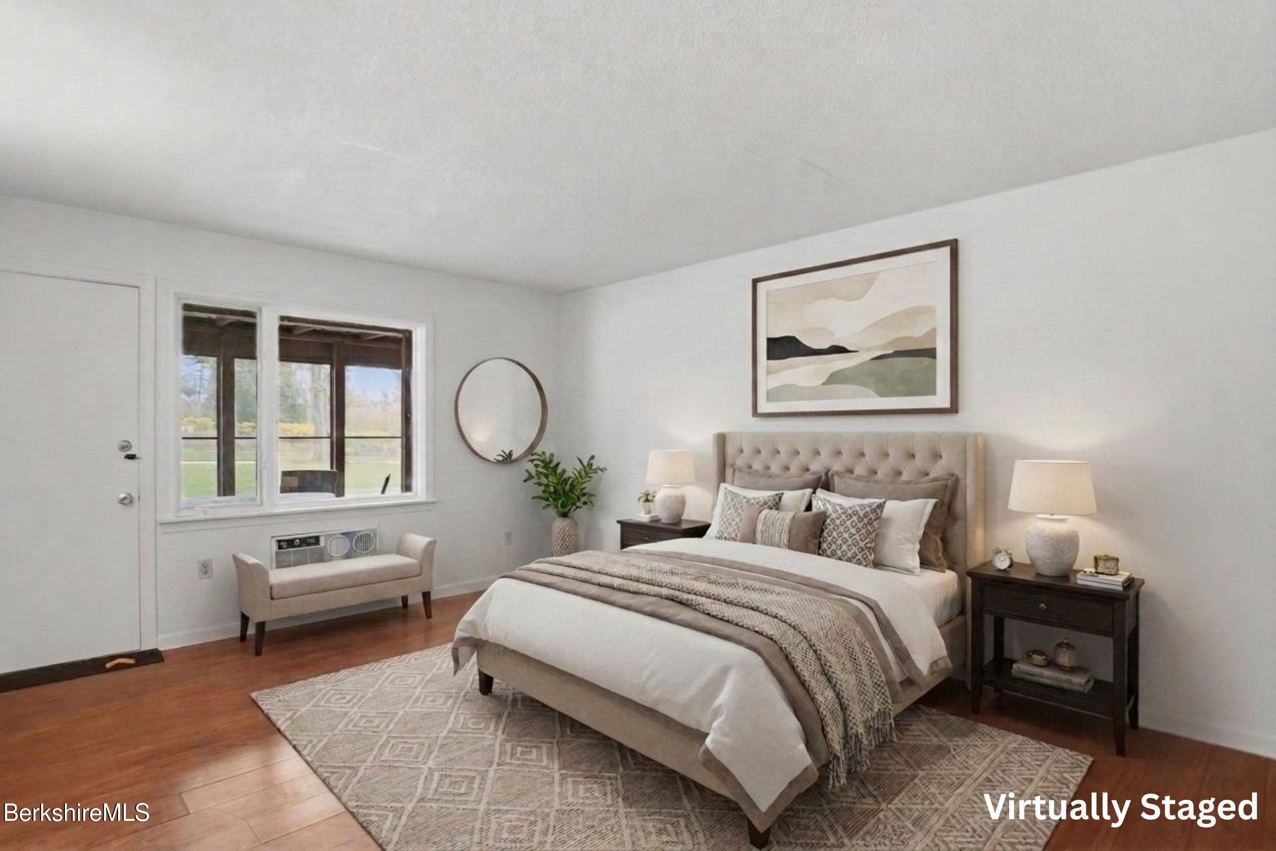 1 Colt Road, Unit 1 Pittsfield, MA 01201 - Photo 19 of 28 a spacious bedroom with a bed and a window