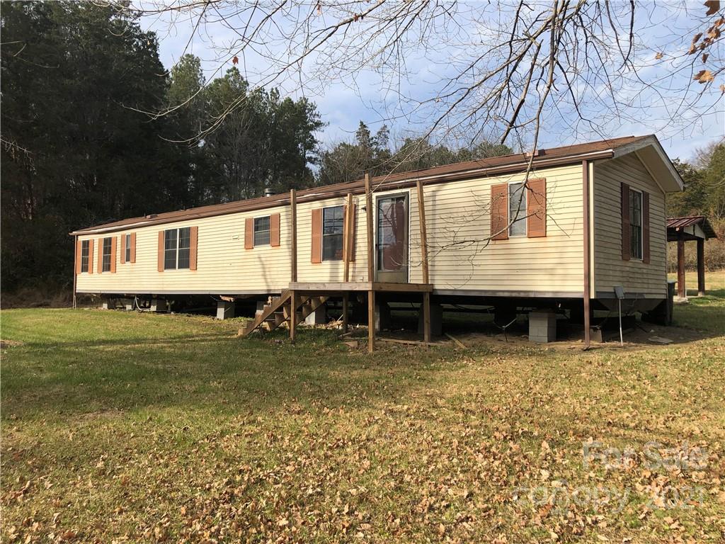992 Flat Swamp Road Denton, NC 27239 - Photo 1 of 6 a view of a house with a yard